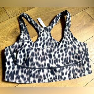 Sports bra. Wide band. Leopard print. Like new. Size Large. Removable Cups.